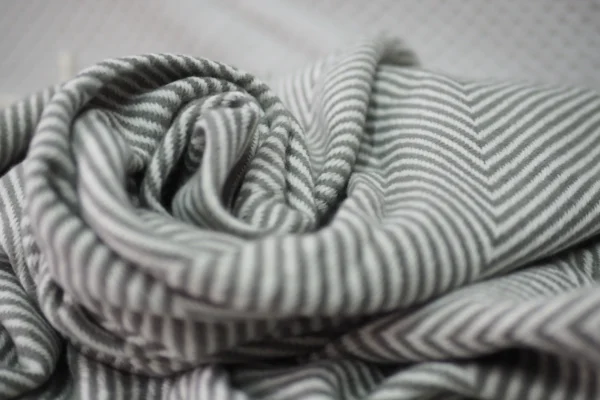 Throw blanket model: SOPHIA GREY.